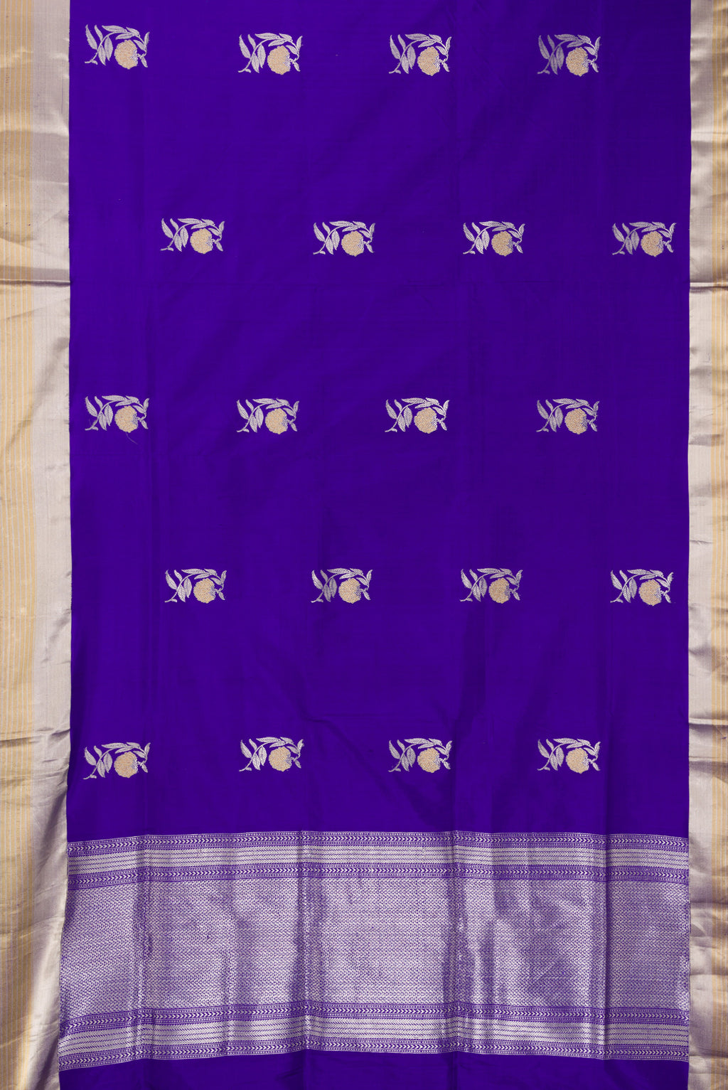 Flat view of Pure Silk Royal Blue Banarasi Saree with Zari Butta on the body and Zari Border. 