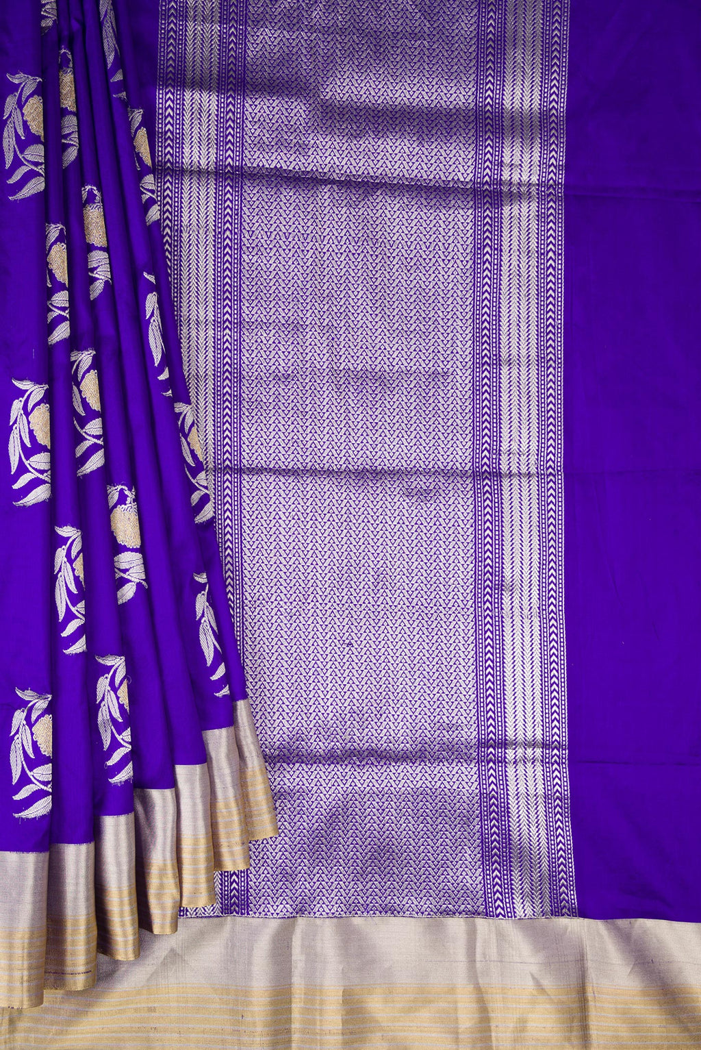 Pleats and pallu of Pure Silk Royal Blue Banarasi Saree with Zari Butta on the body and Zari Border. 