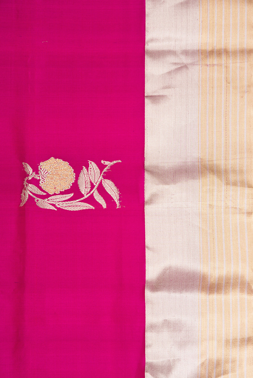 Border image of Pure Silk Magenta Dual Tone Banarasi Saree with Zari Butta on the body and Zari Border. 