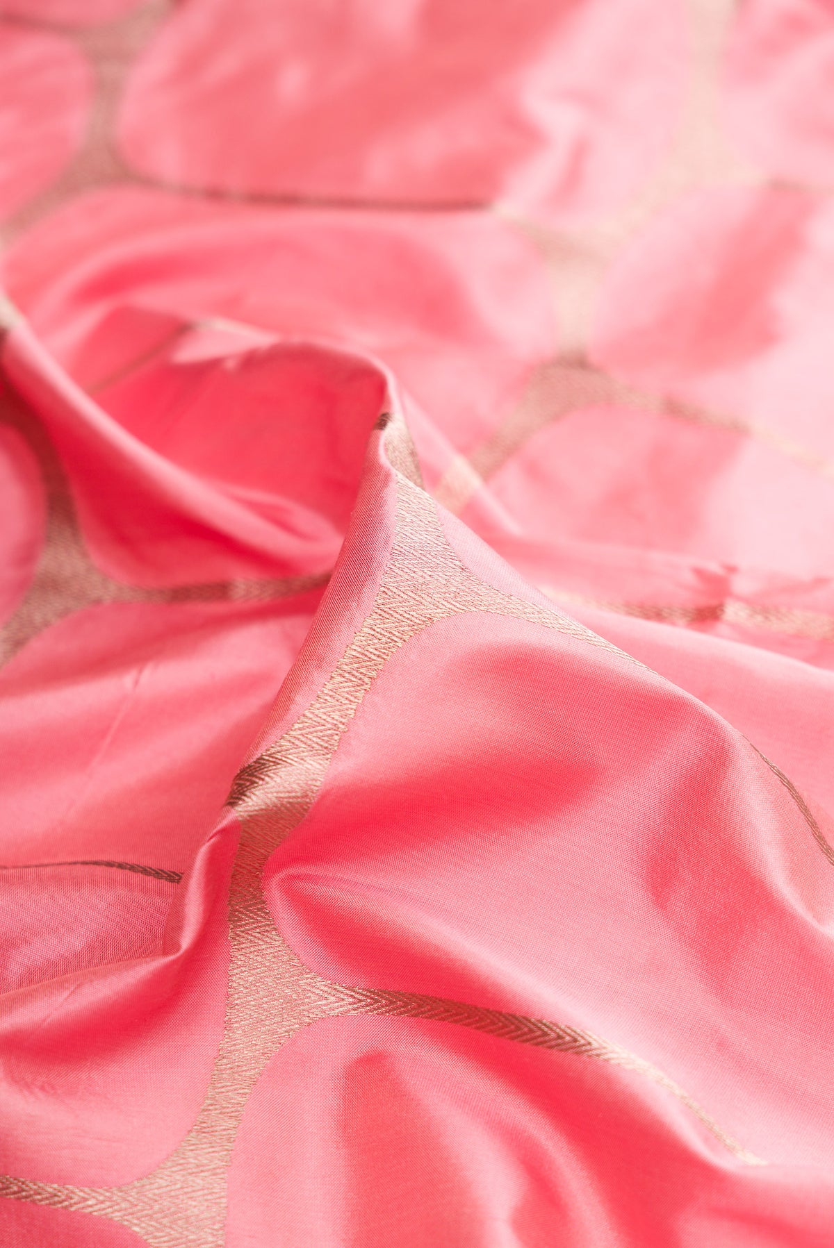 Close up of Pure Silk Pink Dual Tone Banarasi Saree with Zari Brocade on the body and Zari Border.  displaying folds