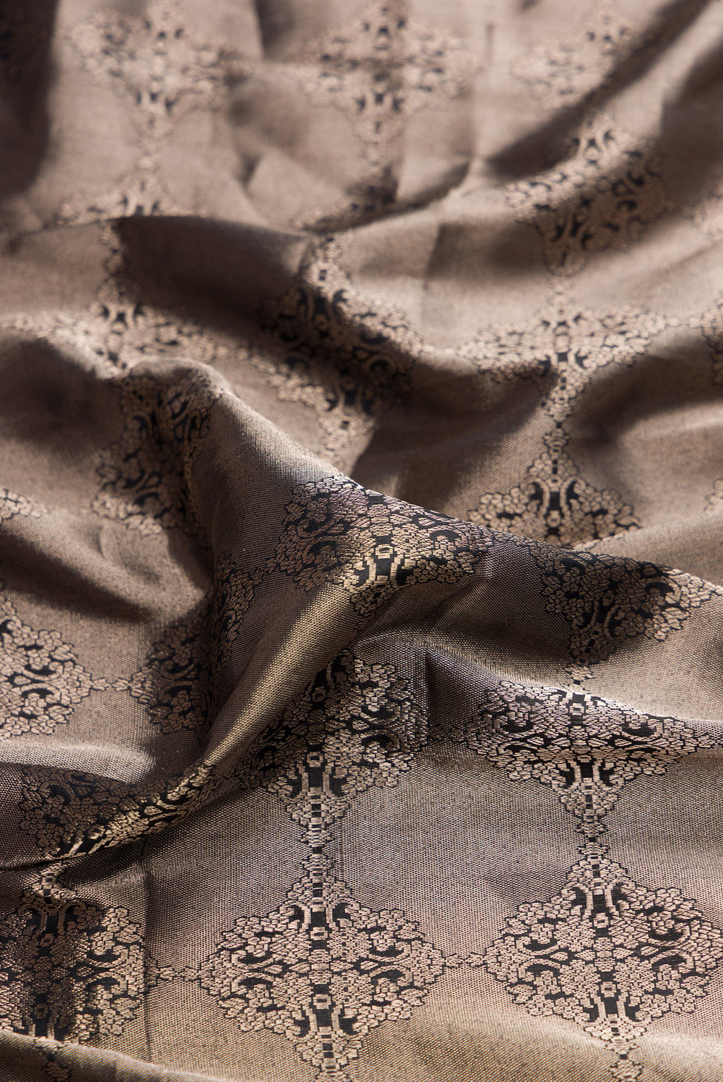 Close up of Pure Silk Black Banarasi Saree with Zari Brocade on the body and Zari Border.  displaying folds