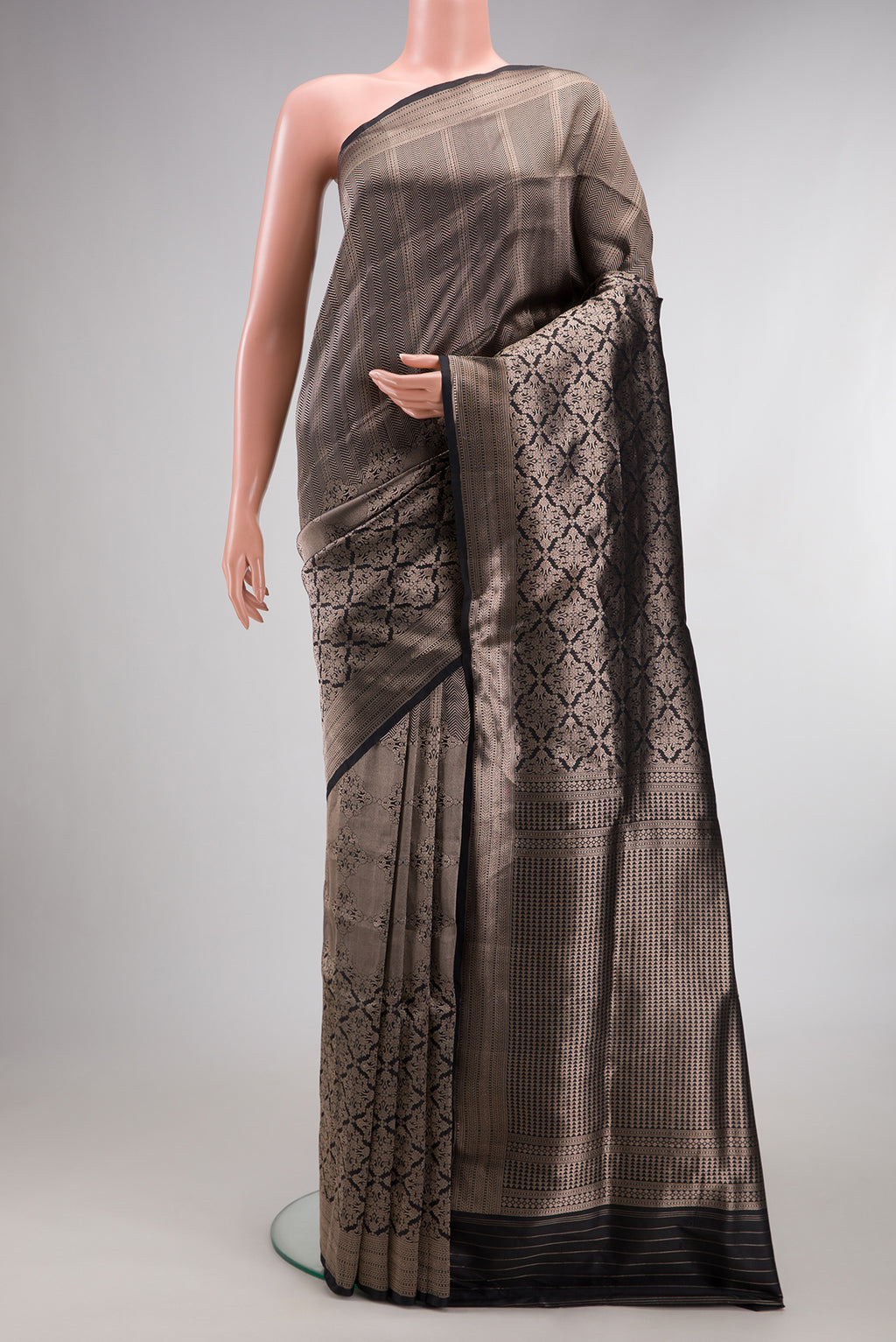 Pure Silk Black Banarasi Saree with Zari Brocade on the body and Zari Border.  displayed on a mannequin