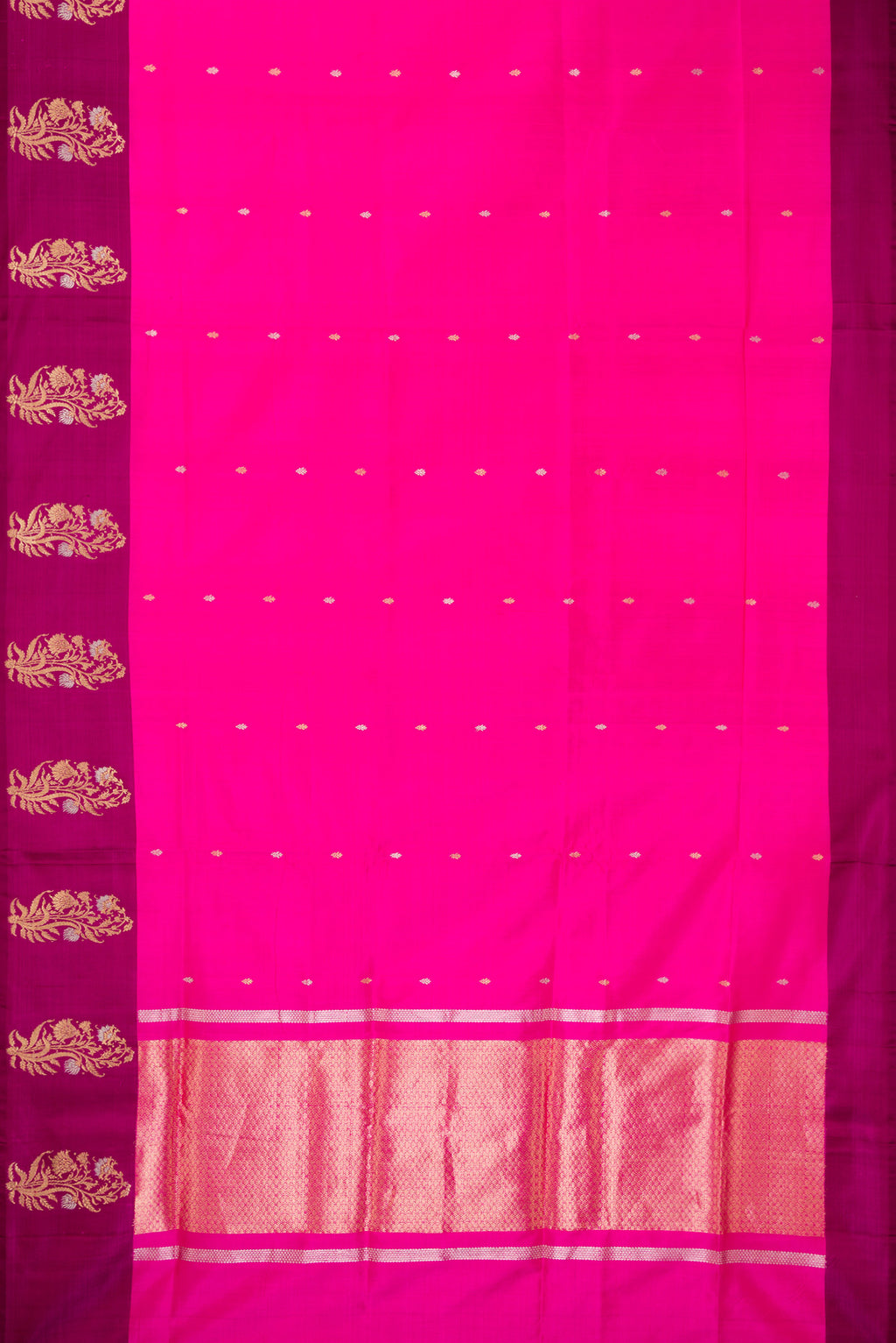 Flat view of Pure Silk Dark Pink Banarasi Saree with Zari Butta on the body and Fancy Border. 