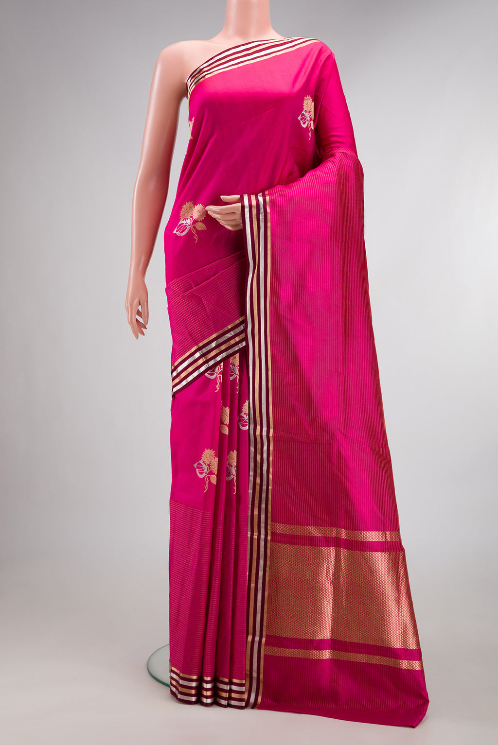 Pure Silk Dark Pink Dual Tone Banarasi Saree with Zari Butta on the body and Fancy Border.  displayed on a mannequin