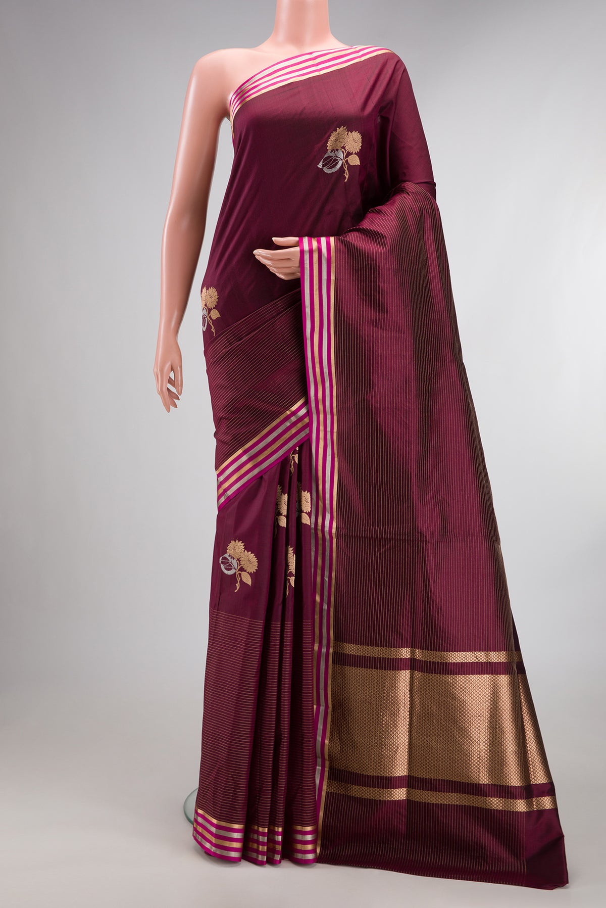Pure Silk Coffee Brown Dual Tone Banarasi Saree with Zari Butta on the body and Zari Border.  displayed on a mannequin