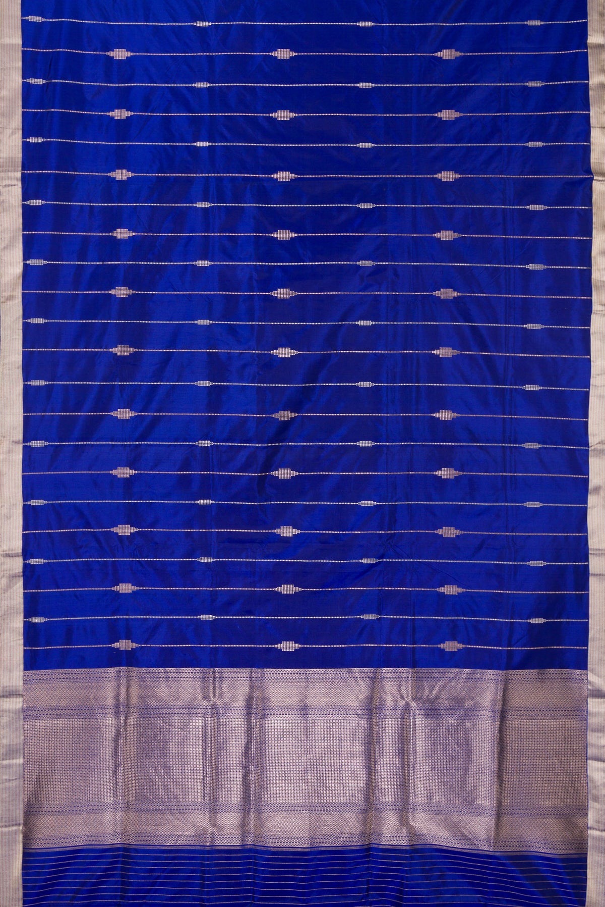 Flat view of Pure Silk Royal Blue Dual Tone Banarasi Saree with Stripes on the body and Zari Border. 