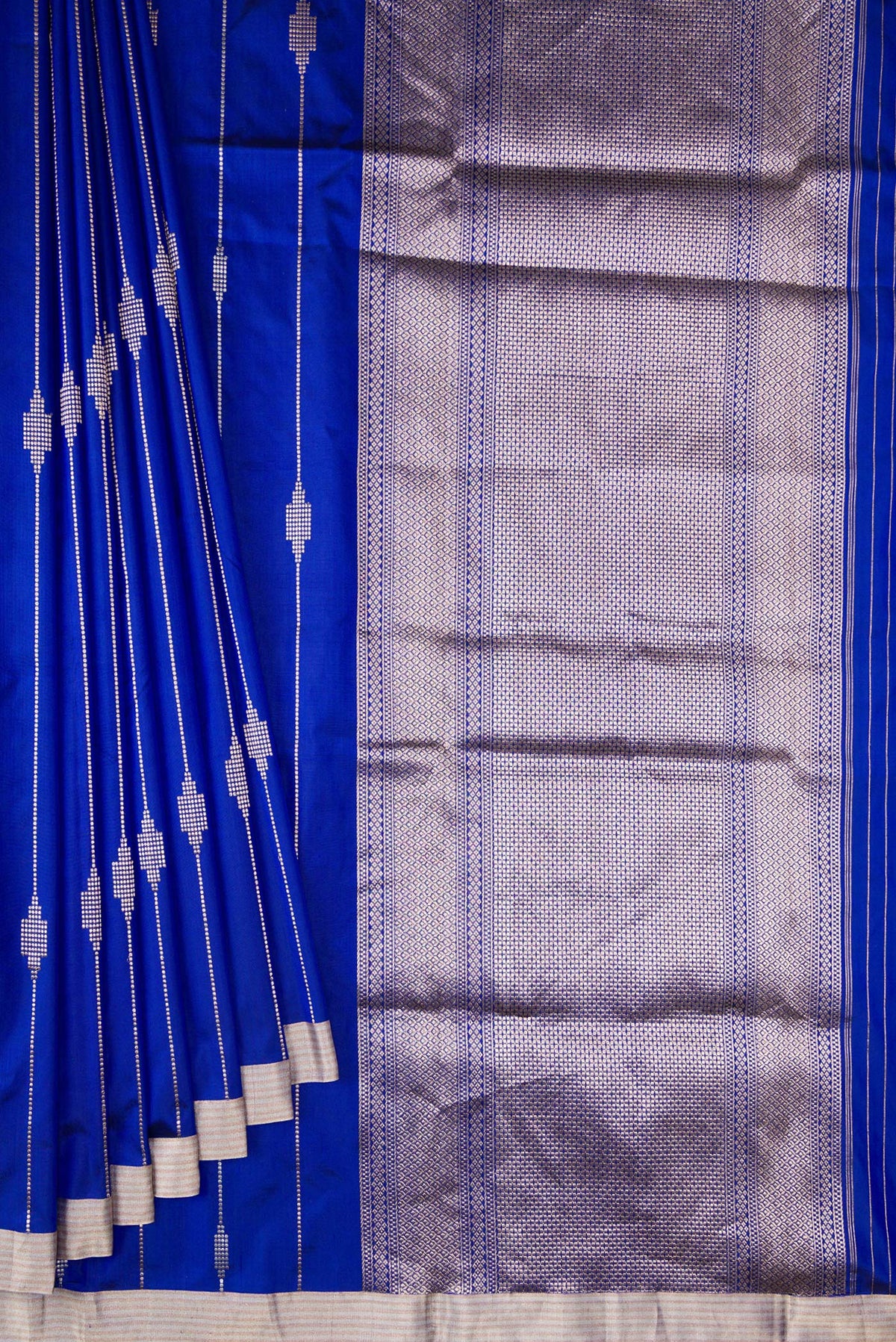 Pleats and pallu of Pure Silk Royal Blue Dual Tone Banarasi Saree with Stripes on the body and Zari Border. 