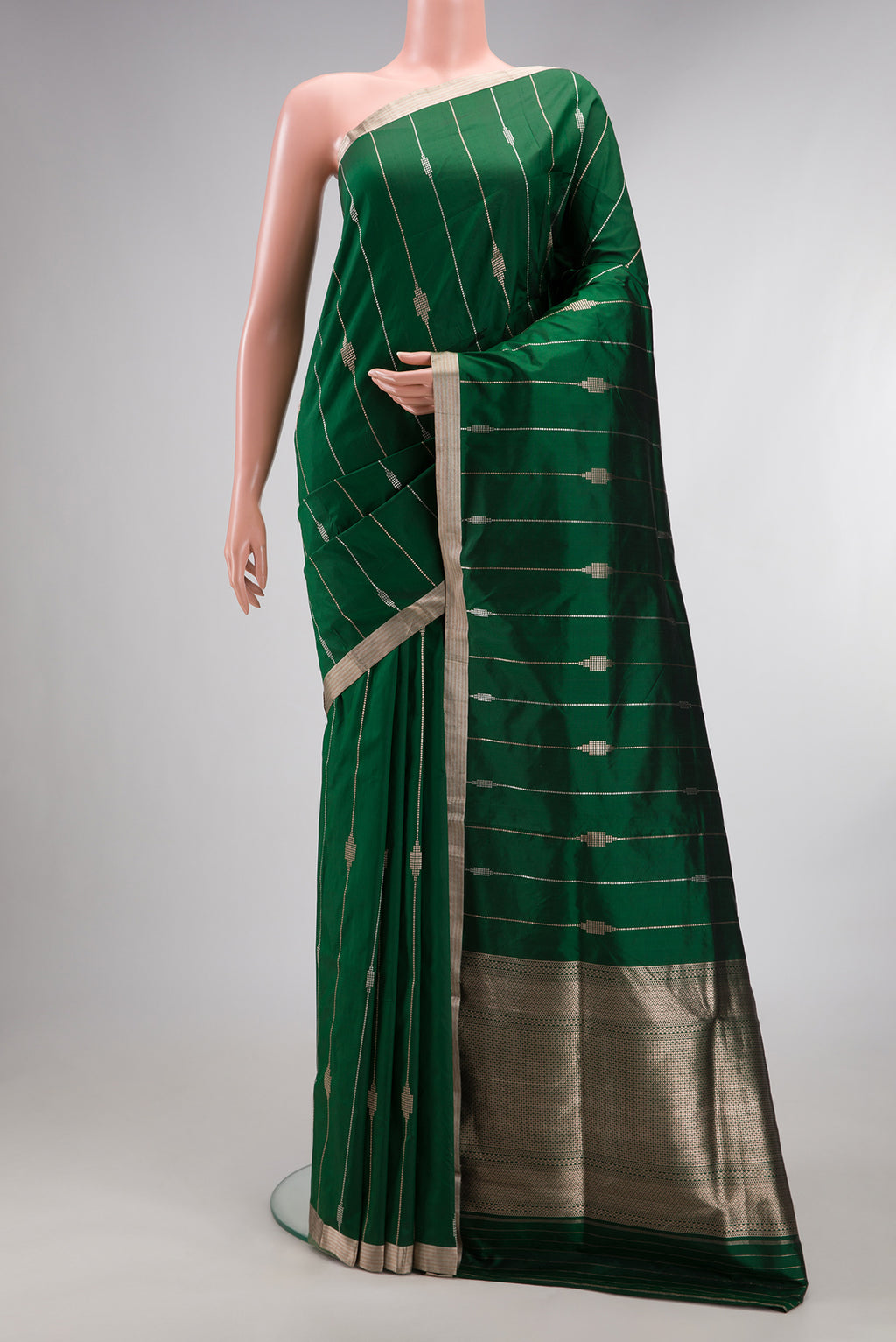 Pure Silk Green Dual Tone Banarasi Saree with Stripes on the body and Zari Border.  displayed on a mannequin