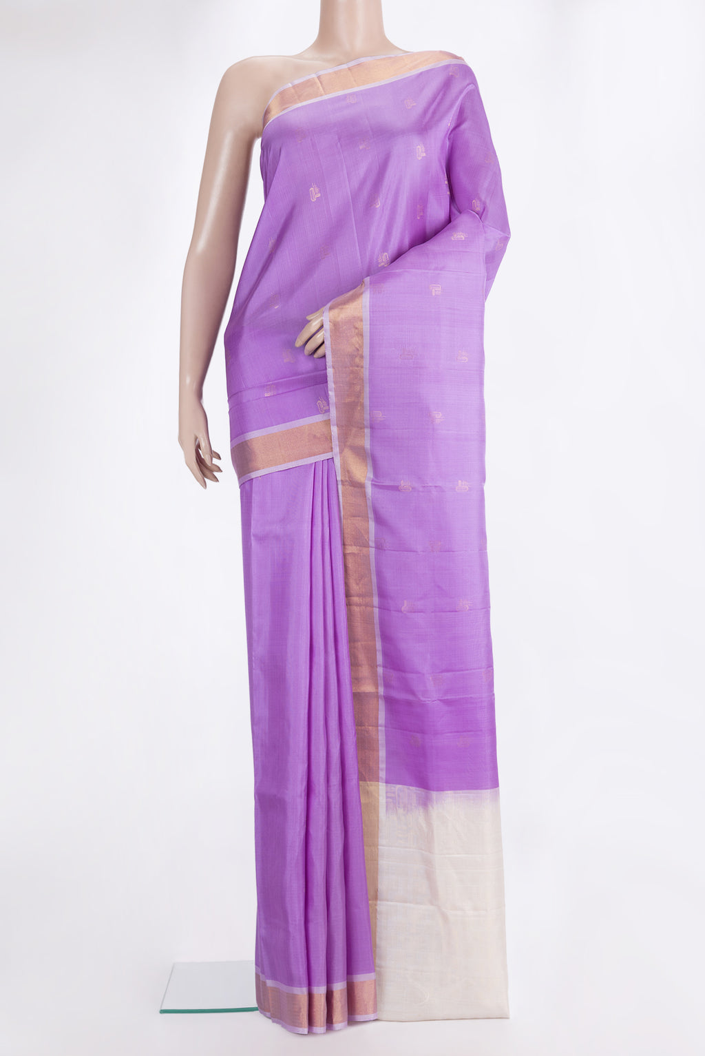 Pure Silk Lavender Soft Saree with Zari Butta on the body and Zari Border.  displayed on a mannequin