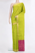 Pure Silk Parrot Green Soft Saree with Zari Butta on the body and Zari Border.  displayed on a mannequin