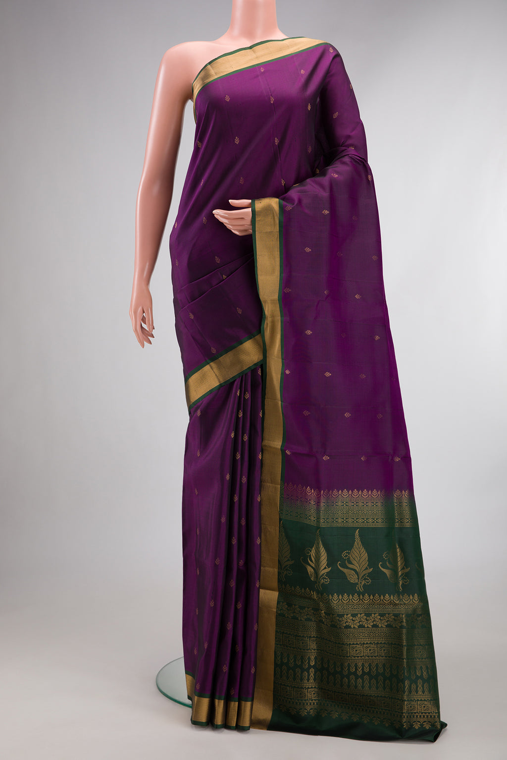 Pure Silk Purple Soft Saree with Zari Butta on the body and Zari Border.  displayed on a mannequin