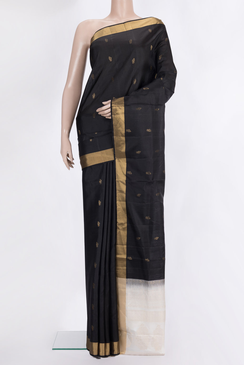 Pure Silk Black Soft Saree with Zari Butta on the body and Zari Border.  displayed on a mannequin