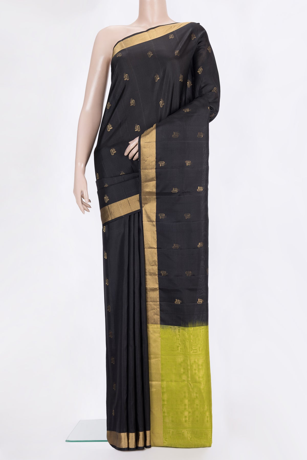 Pure Silk Black Soft Saree with Zari Butta on the body and Zari Border.  displayed on a mannequin