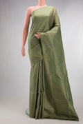 Pure Silk Olive Green Soft Saree with Zari Brocade on the body and Fancy Border.  displayed on a mannequin