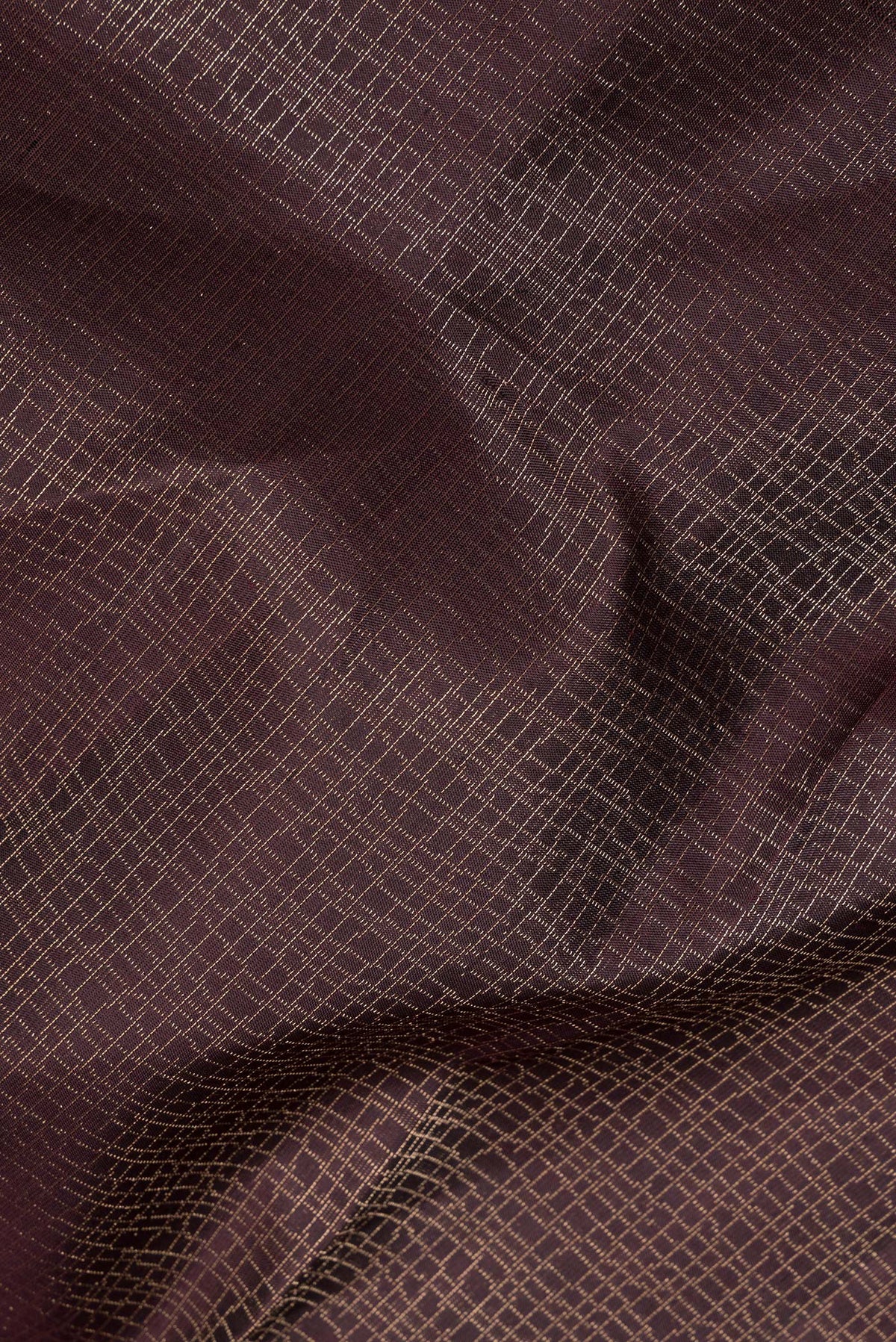 Close up of Pure Silk Coffee Brown Soft Saree with Zari Brocade on the body and Fancy Border.  displaying folds