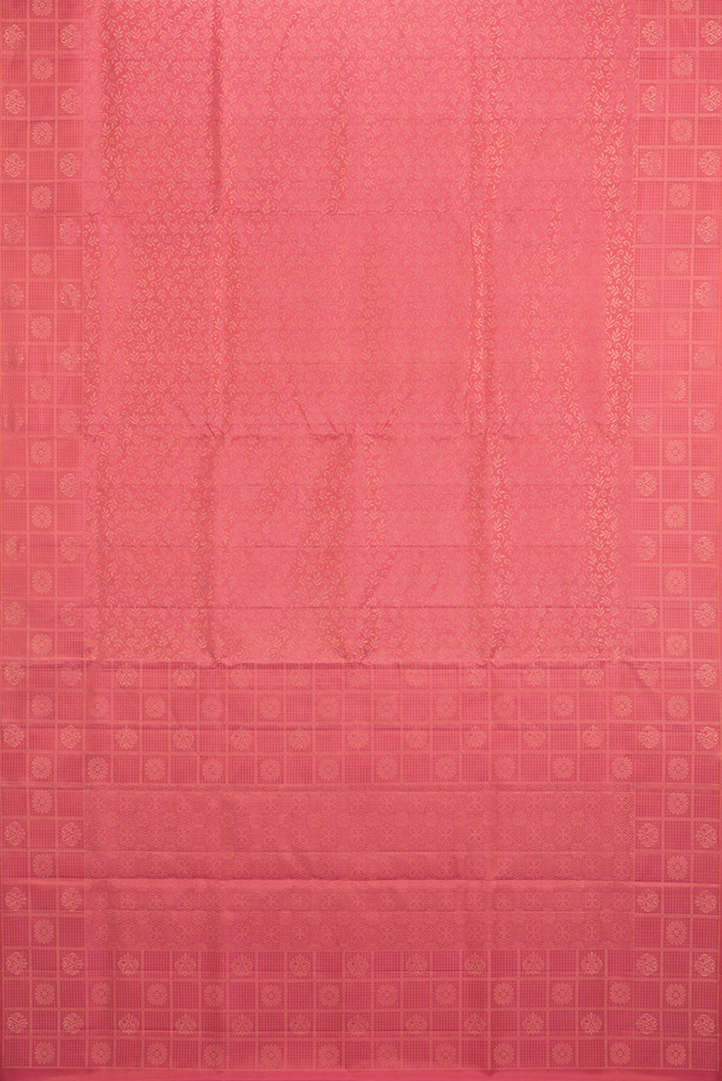 Flat view of Pure Silk Coral Soft Saree with Zari Brocade on the body and Fancy Border. 
