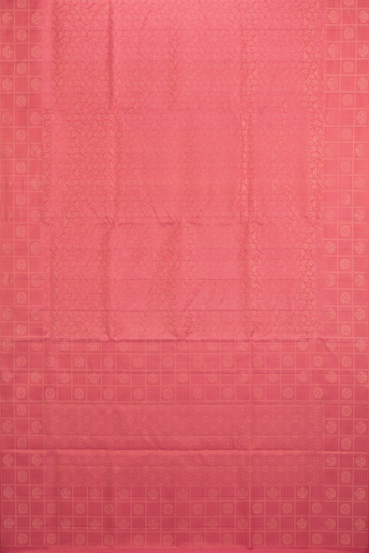 Flat view of Pure Silk Coral Soft Saree with Zari Brocade on the body and Fancy Border. 