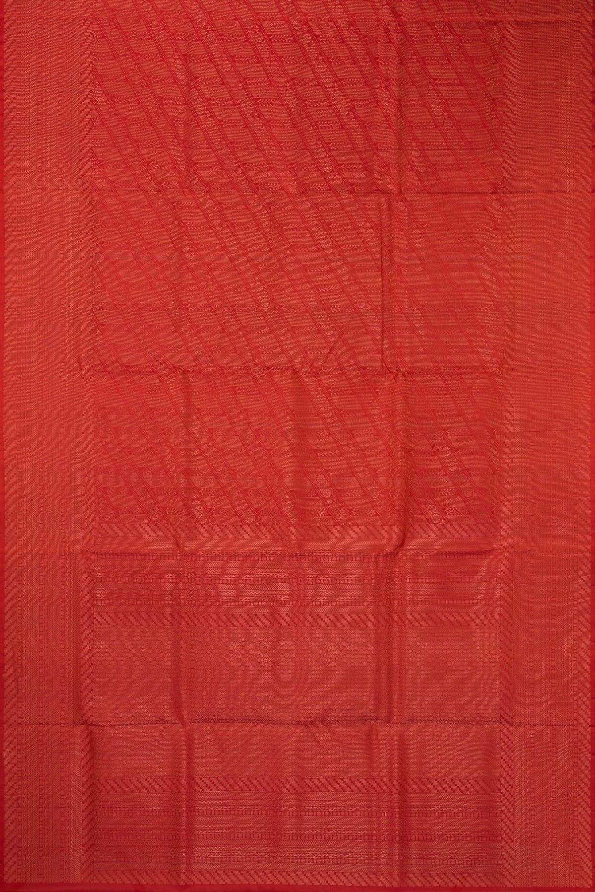 Flat view of Pure Silk Orange Soft Saree with Zari Brocade on the body and Fancy Border. 