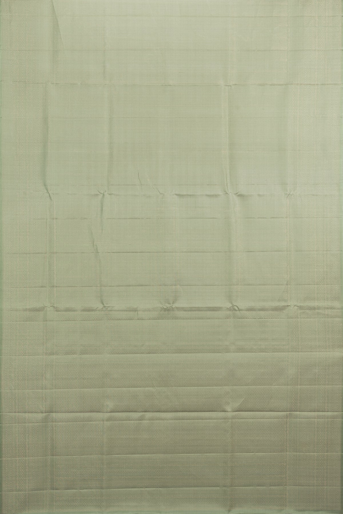 Flat view of Pure Silk Sage Green Soft Saree with Zari Brocade on the body and Fancy Border. 