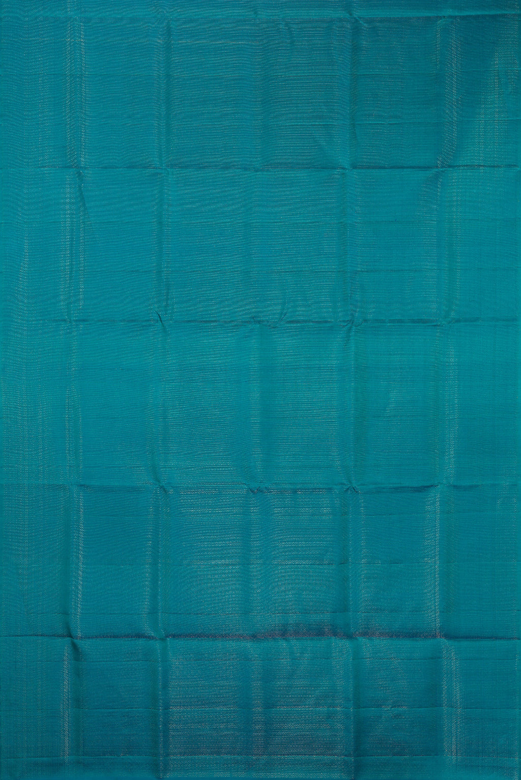 Flat view of Pure Silk Peacock Blue Soft Saree with Zari Brocade on the body and Fancy Border. 