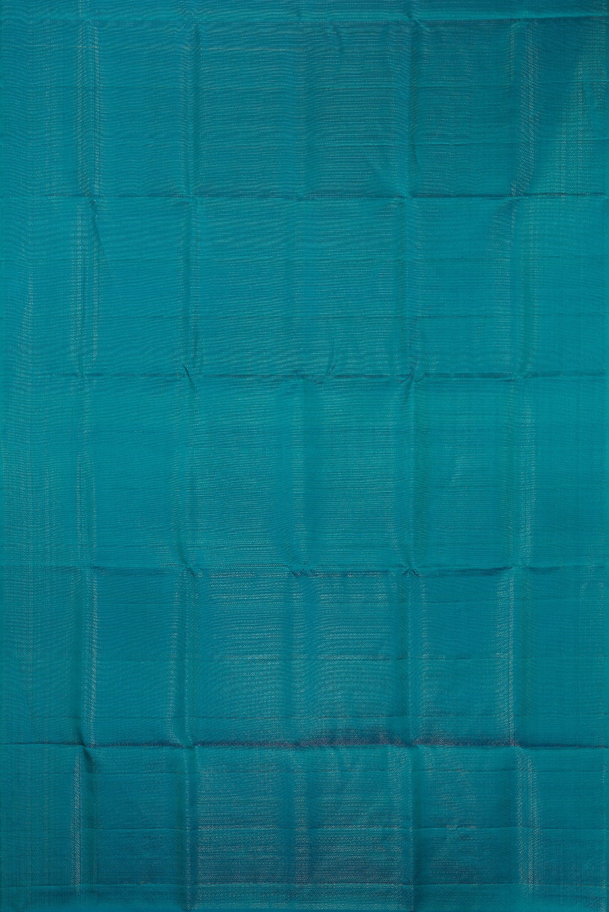 Flat view of Pure Silk Peacock Blue Soft Saree with Zari Brocade on the body and Fancy Border. 