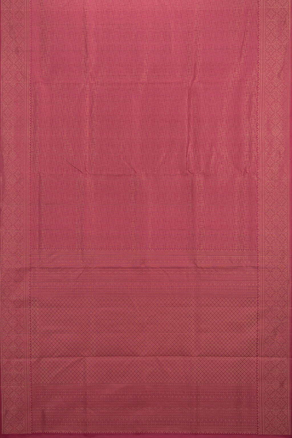 Flat view of Pure Silk Coral Soft Saree with Zari Brocade on the body and Fancy Border. 