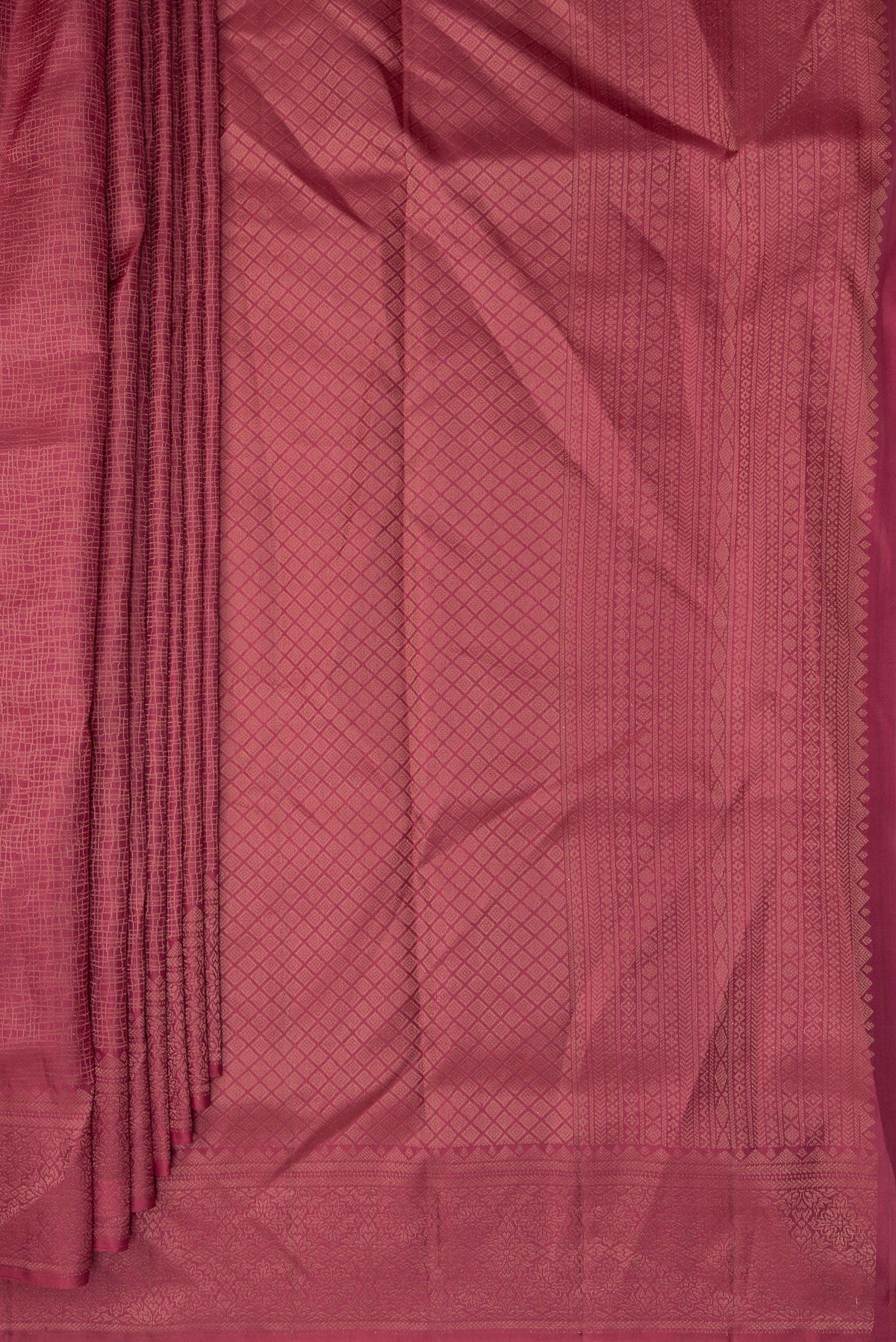 Pleats and pallu of Pure Silk Coral Soft Saree with Zari Brocade on the body and Fancy Border. 