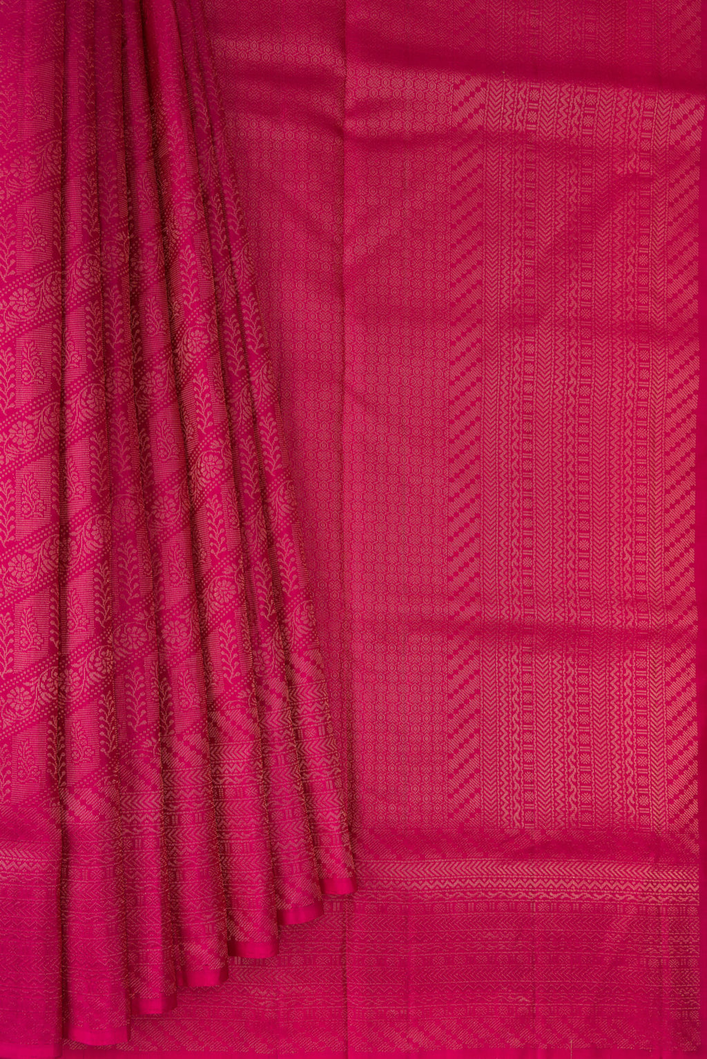 Pleats and pallu of Pure Silk Dark Pink Soft Saree with Zari Brocade on the body and Fancy Border. 