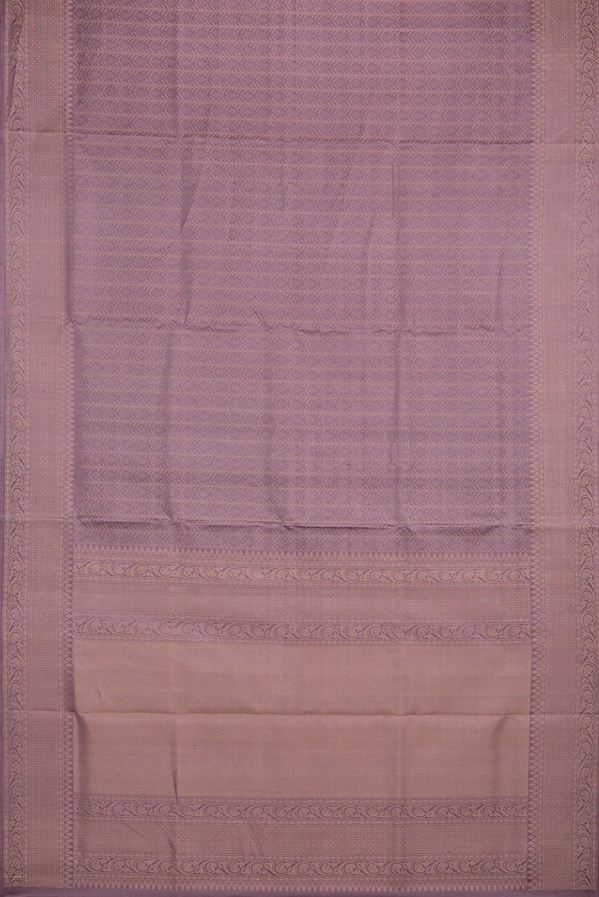 Flat view of Pure Silk Mauve Soft Saree with Zari Brocade on the body and Fancy Border. 