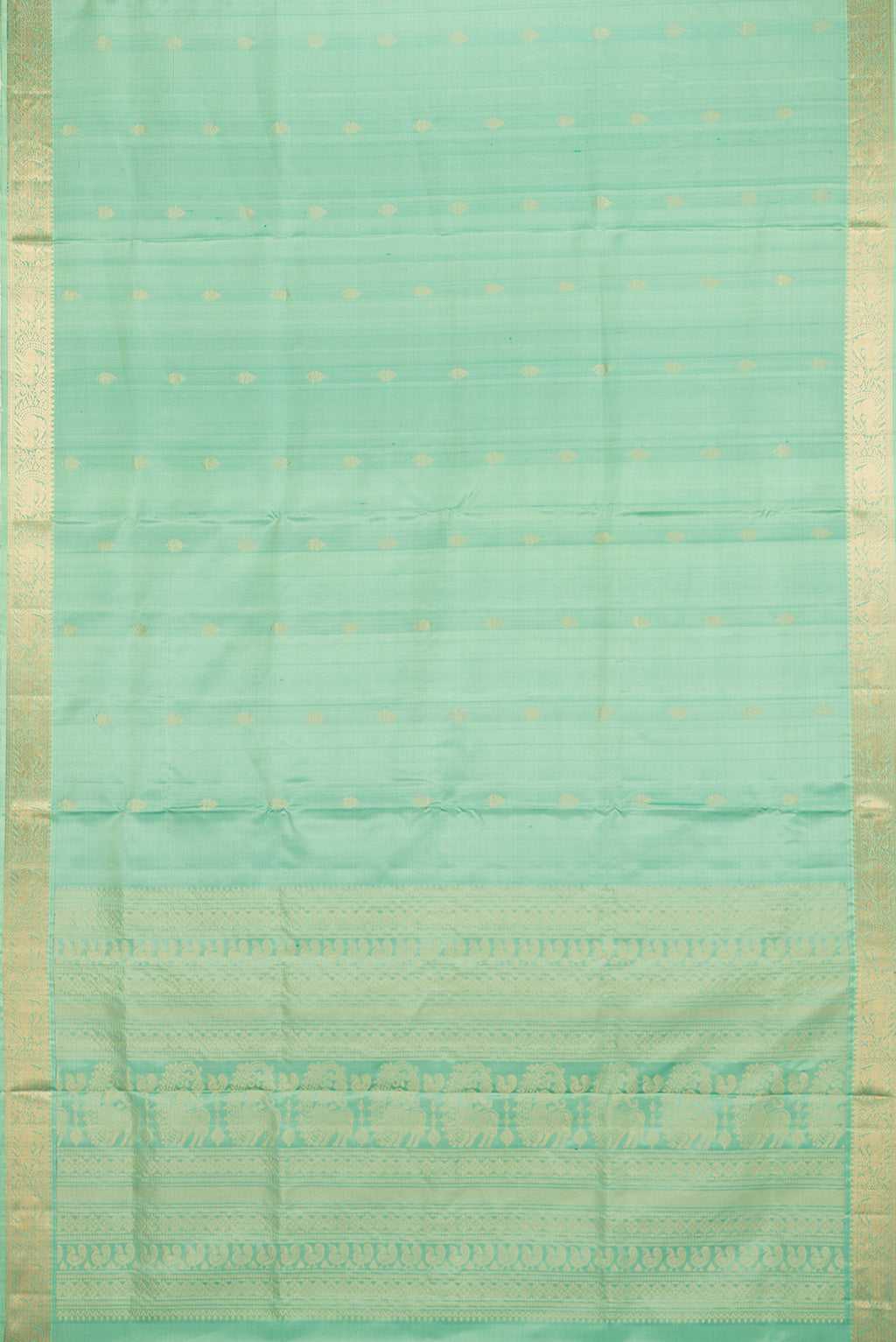 Flat view of Pure Silk Green Soft Saree with Zari Butta on the body and Zari Border. 