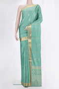 Pure Silk Sea Green Soft Saree with Zari Butta on the body and Zari Border.  displayed on a mannequin