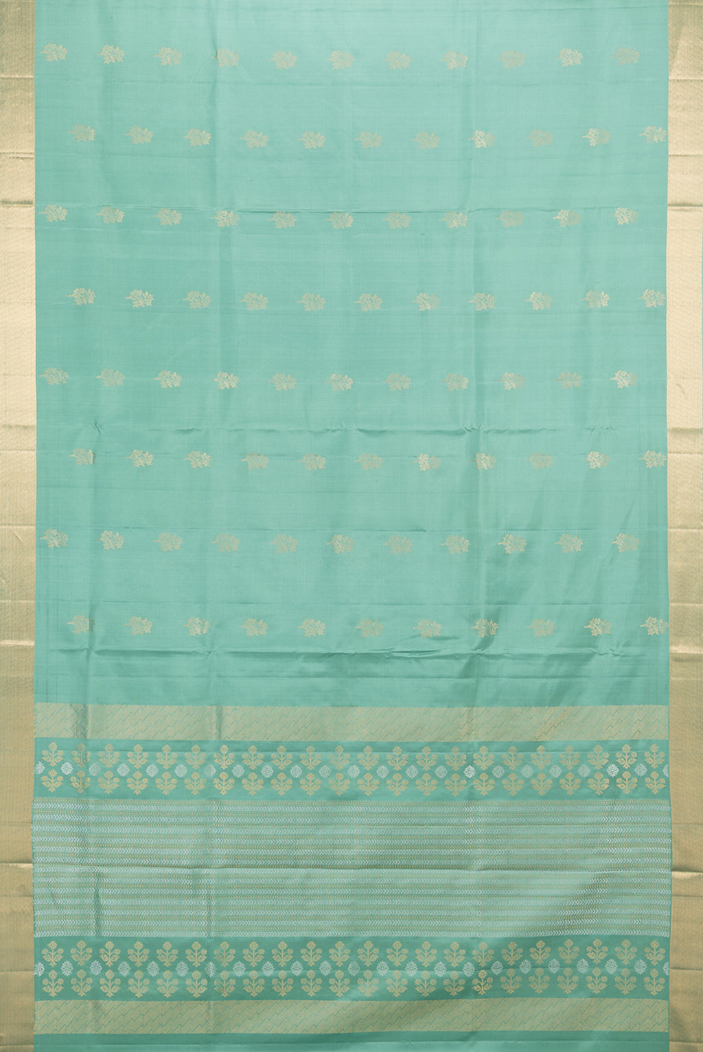 Flat view of Pure Silk Sea Green Soft Saree with Zari Butta on the body and Zari Border. 