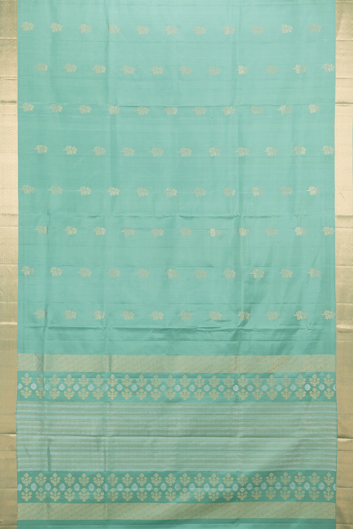 Flat view of Pure Silk Sea Green Soft Saree with Zari Butta on the body and Zari Border. 