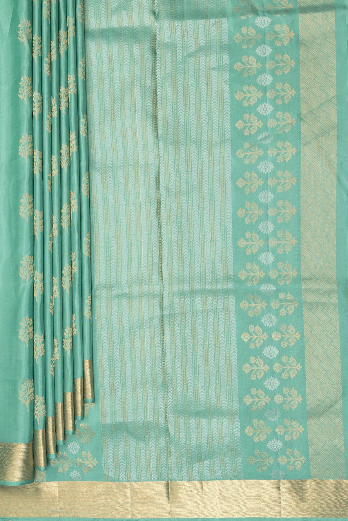 Pleats and pallu of Pure Silk Sea Green Soft Saree with Zari Butta on the body and Zari Border. 