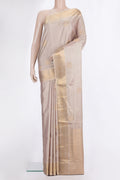Pure Silk Rose Gold Soft Saree with Zari Butta on the body and Zari Border.  displayed on a mannequin