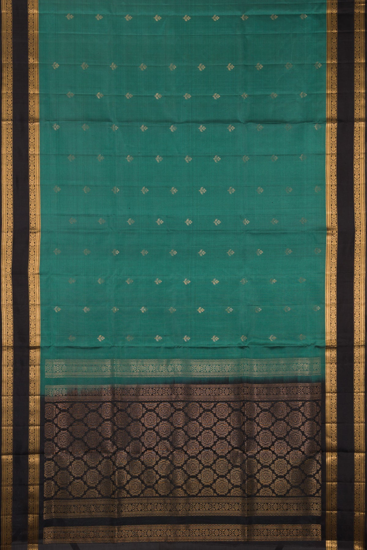 Flat view of Pure Silk Green Soft Saree with Zari Butta on the body and Zari Border. 