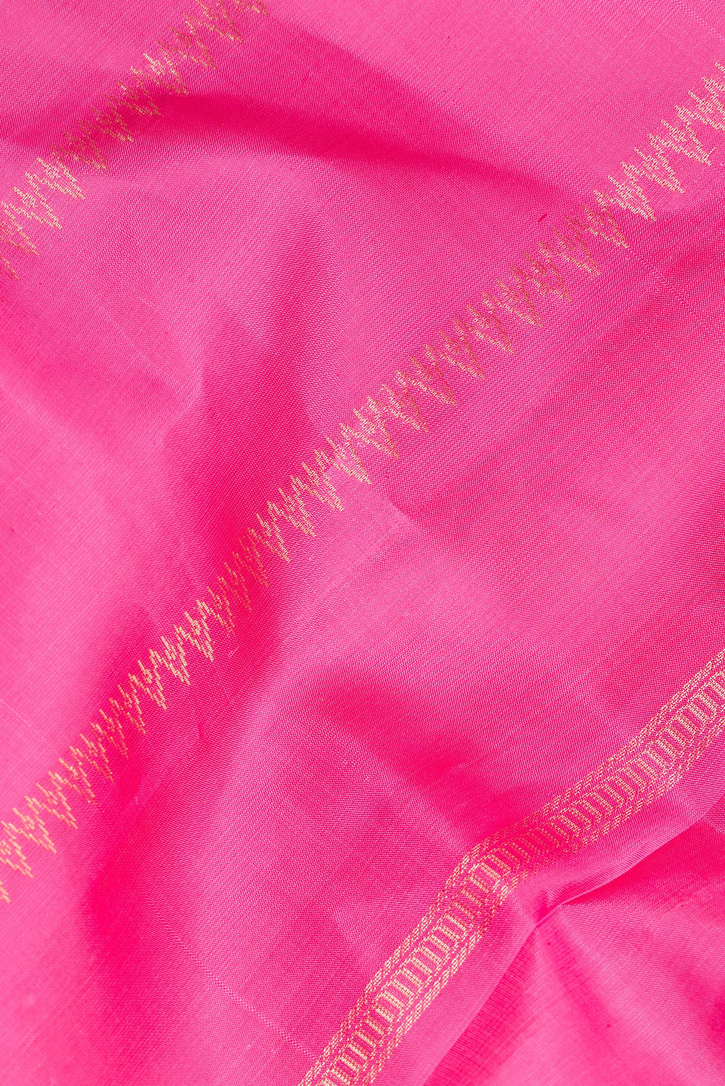 Close up of Pure Silk Pink Soft Saree with Stripes on the body and Without Border.  displaying folds
