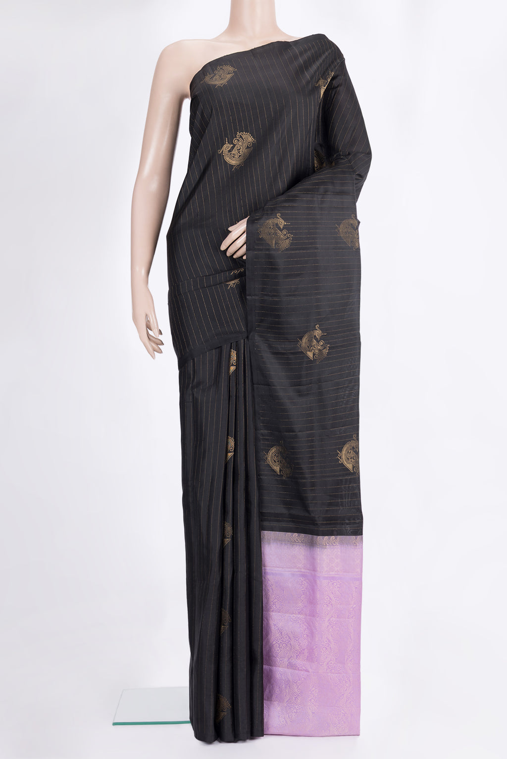 Pure Silk Black Soft Saree with Zari Butta on the body and Without Border.  displayed on a mannequin