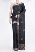 Pure Silk Black Soft Saree with Zari Butta on the body and Zari Border.  displayed on a mannequin