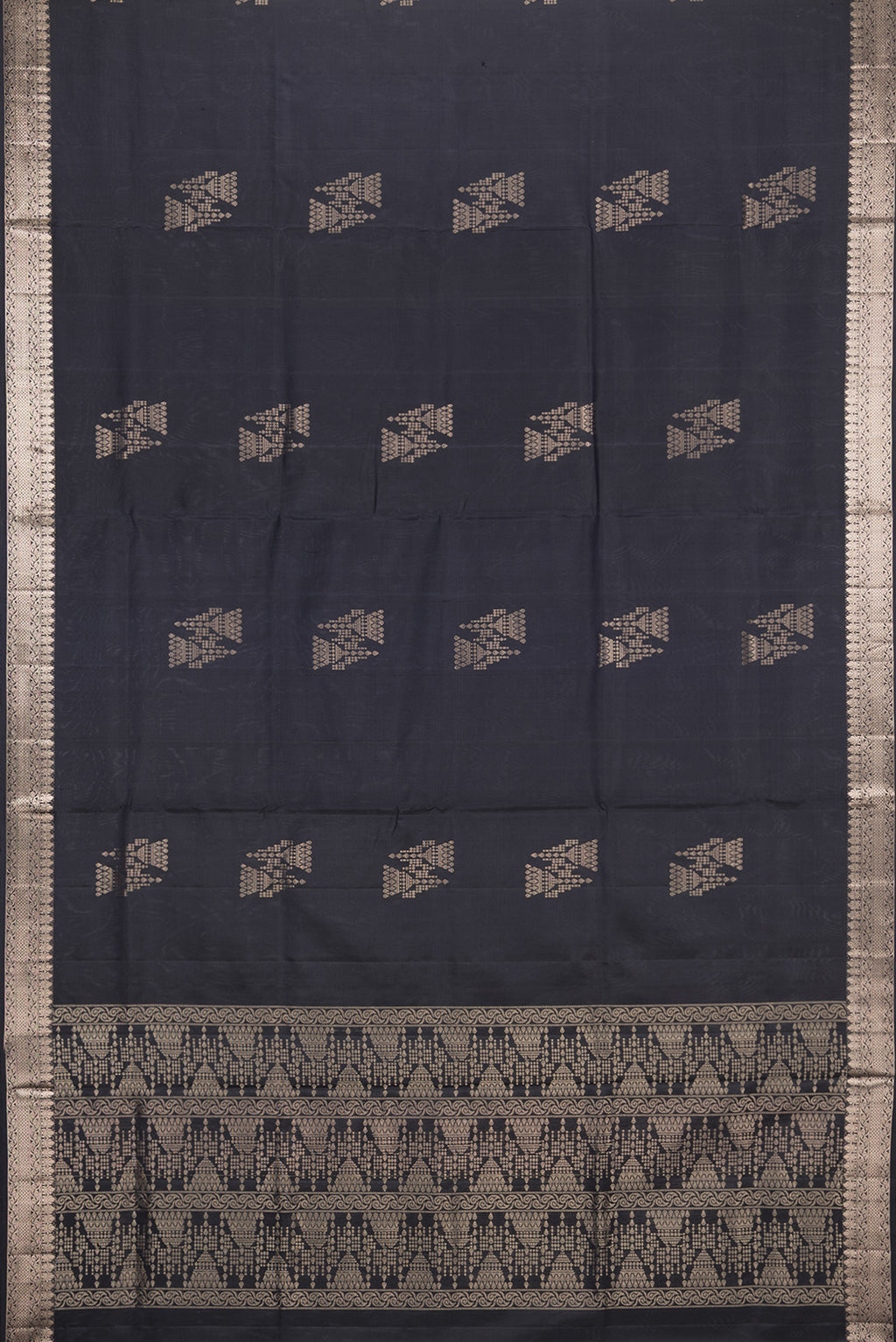 Flat view of Pure Silk Black Soft Saree with Zari Butta on the body and Zari Border. 