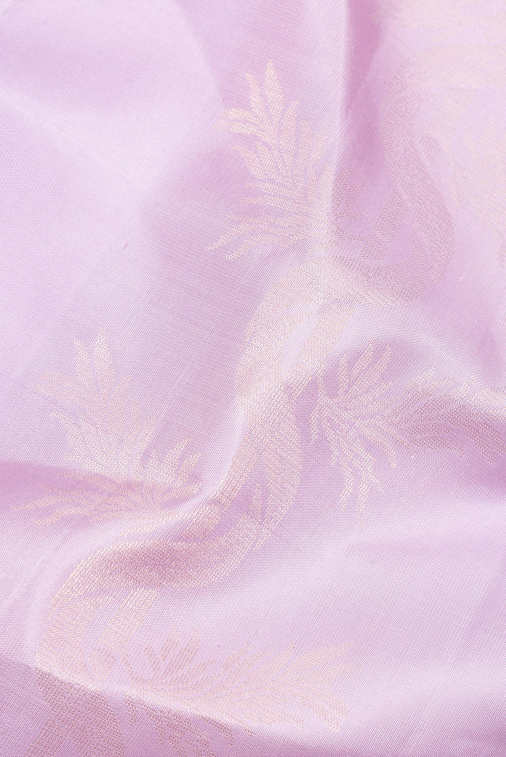 Close up of Pure Silk Lavender Soft Saree with Zari Butta on the body and Without Border.  displaying folds