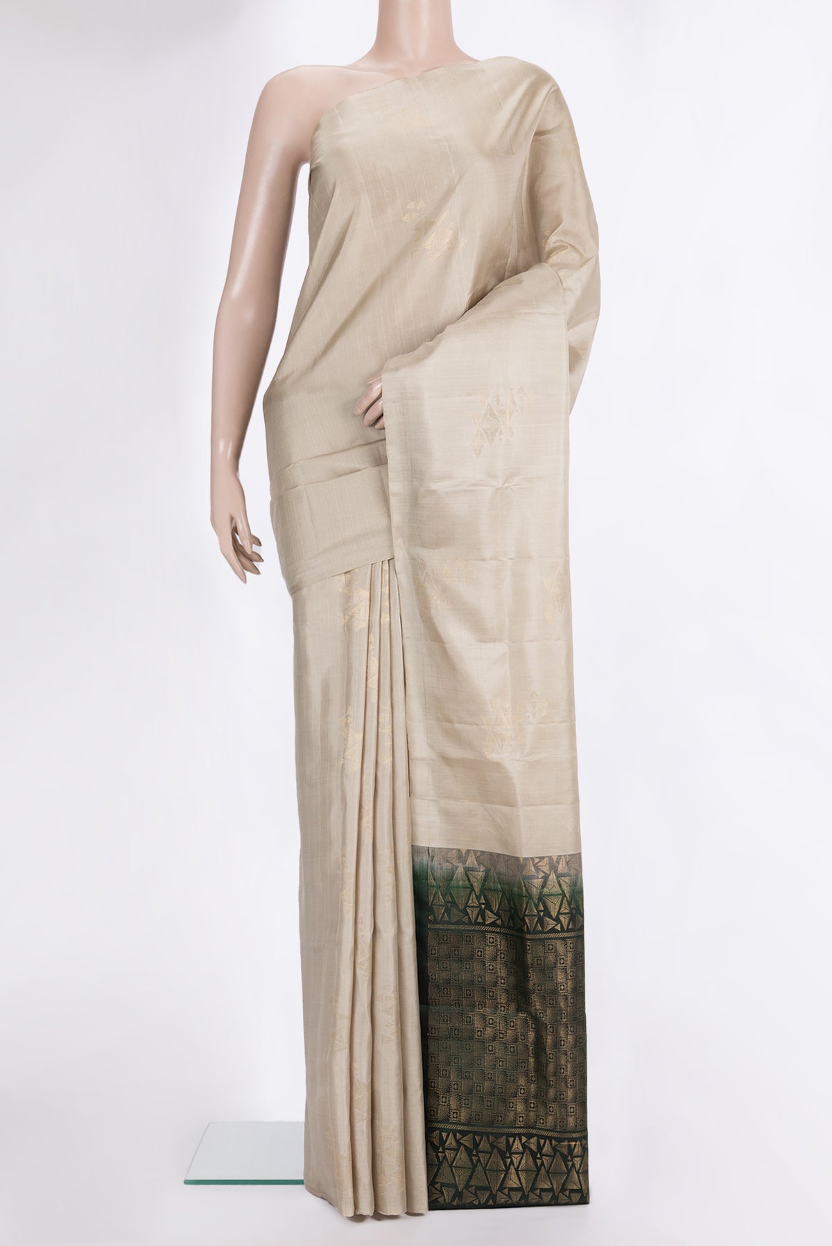Pure Silk Beige Dual Tone Soft Saree with Zari Butta on the body and Without Border.  displayed on a mannequin