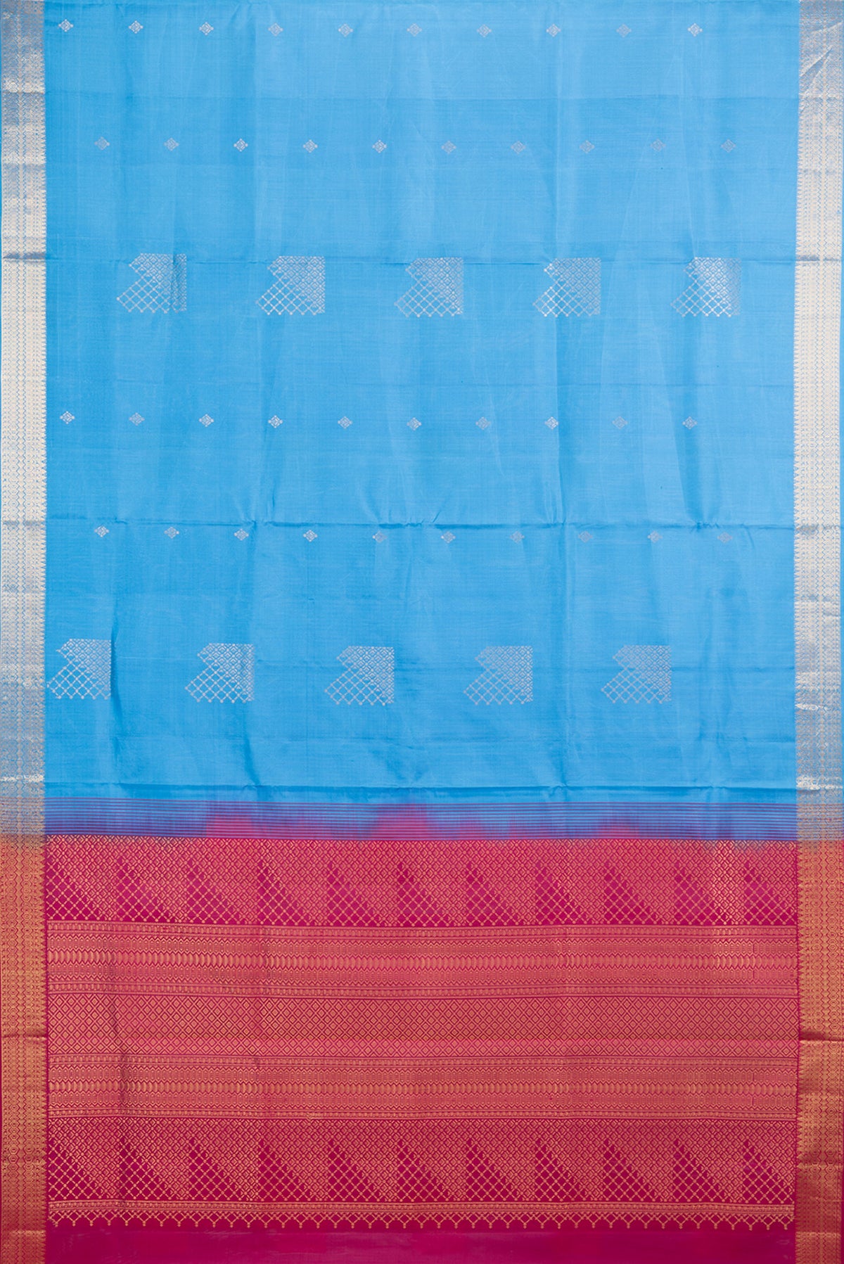 Flat view of Pure Silk Sky Blue Soft Saree with Zari Butta on the body and Zari Border. 