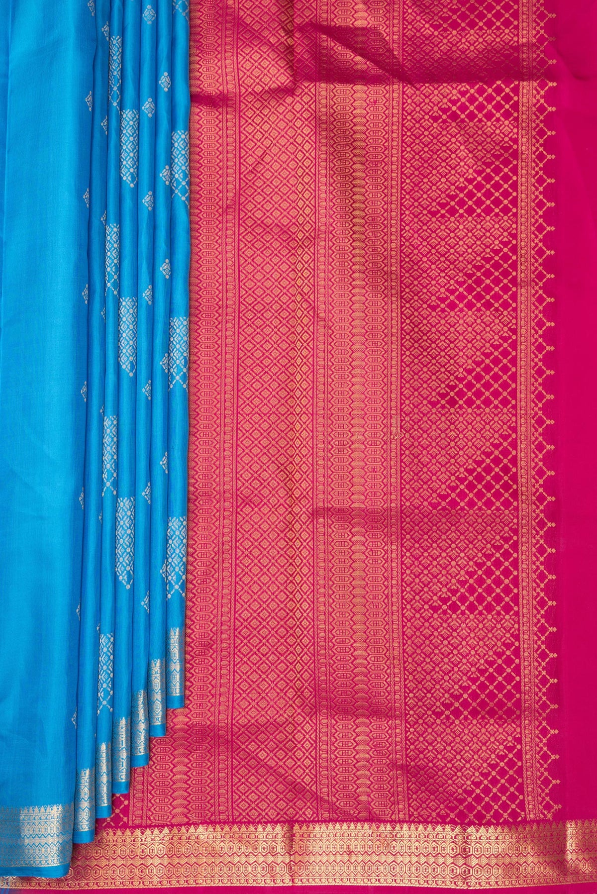 Pleats and pallu of Pure Silk Sky Blue Soft Saree with Zari Butta on the body and Zari Border. 