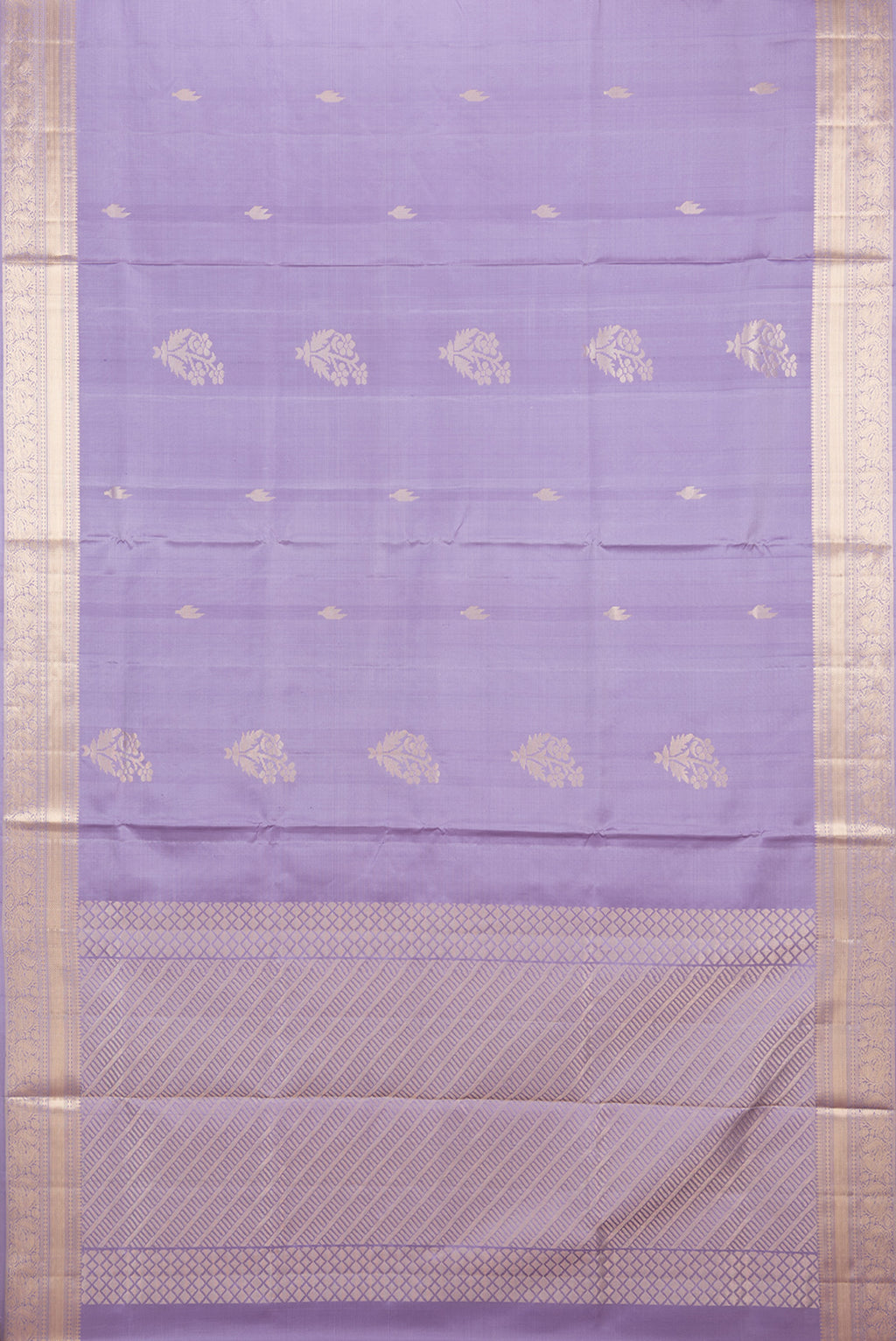 Flat view of Pure Silk Lilac Soft Saree with Zari Butta on the body and Zari Border. 