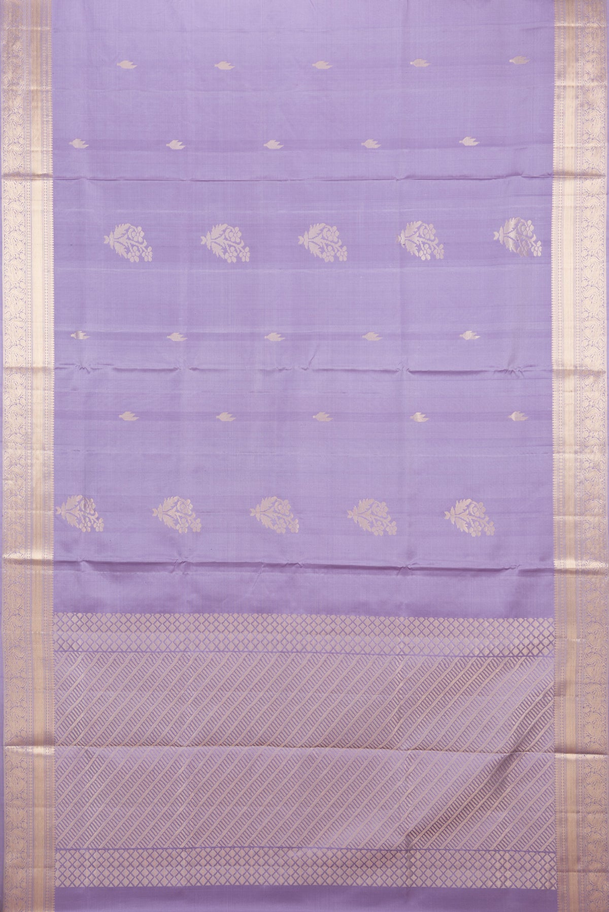 Flat view of Pure Silk Lilac Soft Saree with Zari Butta on the body and Zari Border. 
