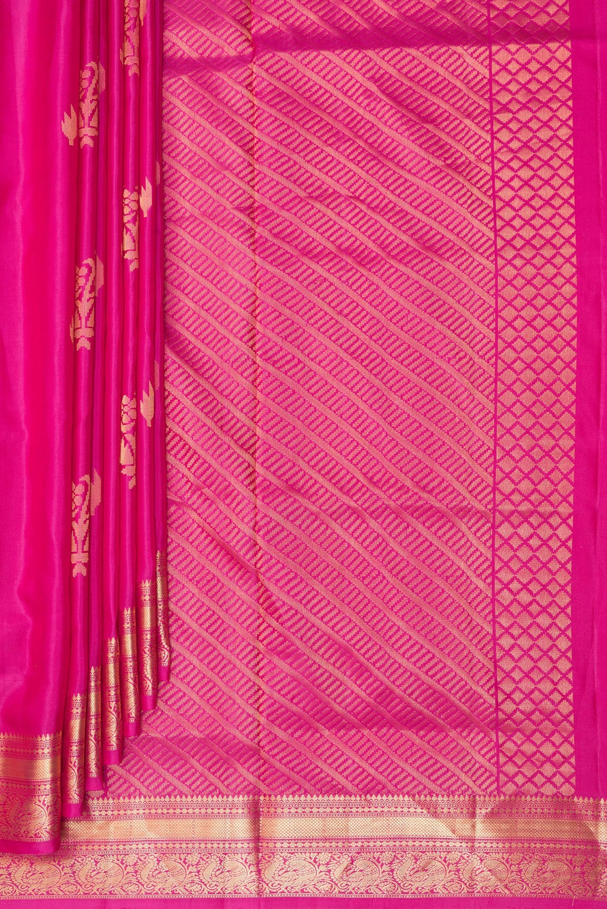 Pleats and pallu of Pure Silk Dark Pink Soft Saree with Zari Butta on the body and Zari Border. 