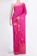 Pure Silk Rani Pink Soft Saree with Zari Butta on the body and Zari Border.  displayed on a mannequin