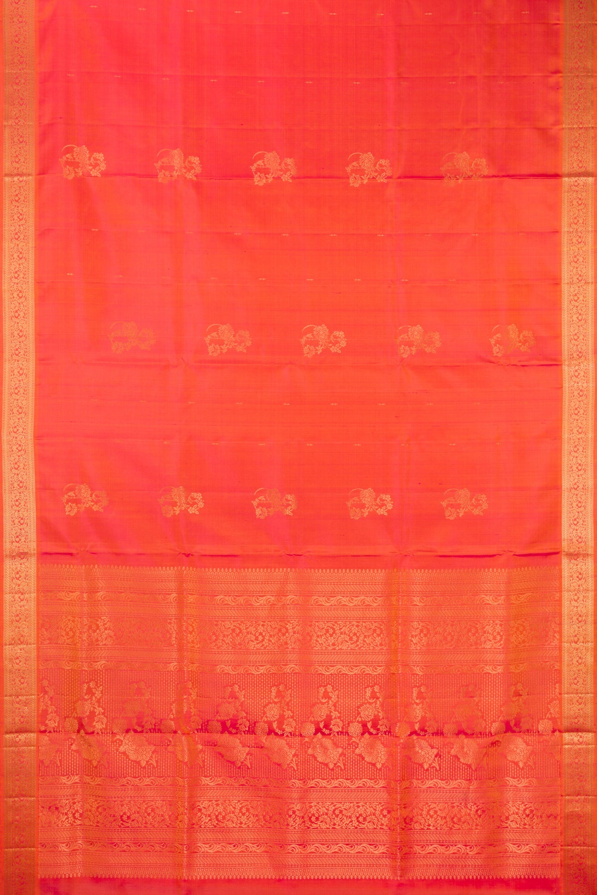 Flat view of Pure Silk Coral Dual Tone Soft Saree with Zari Butta on the body and Zari Border. 