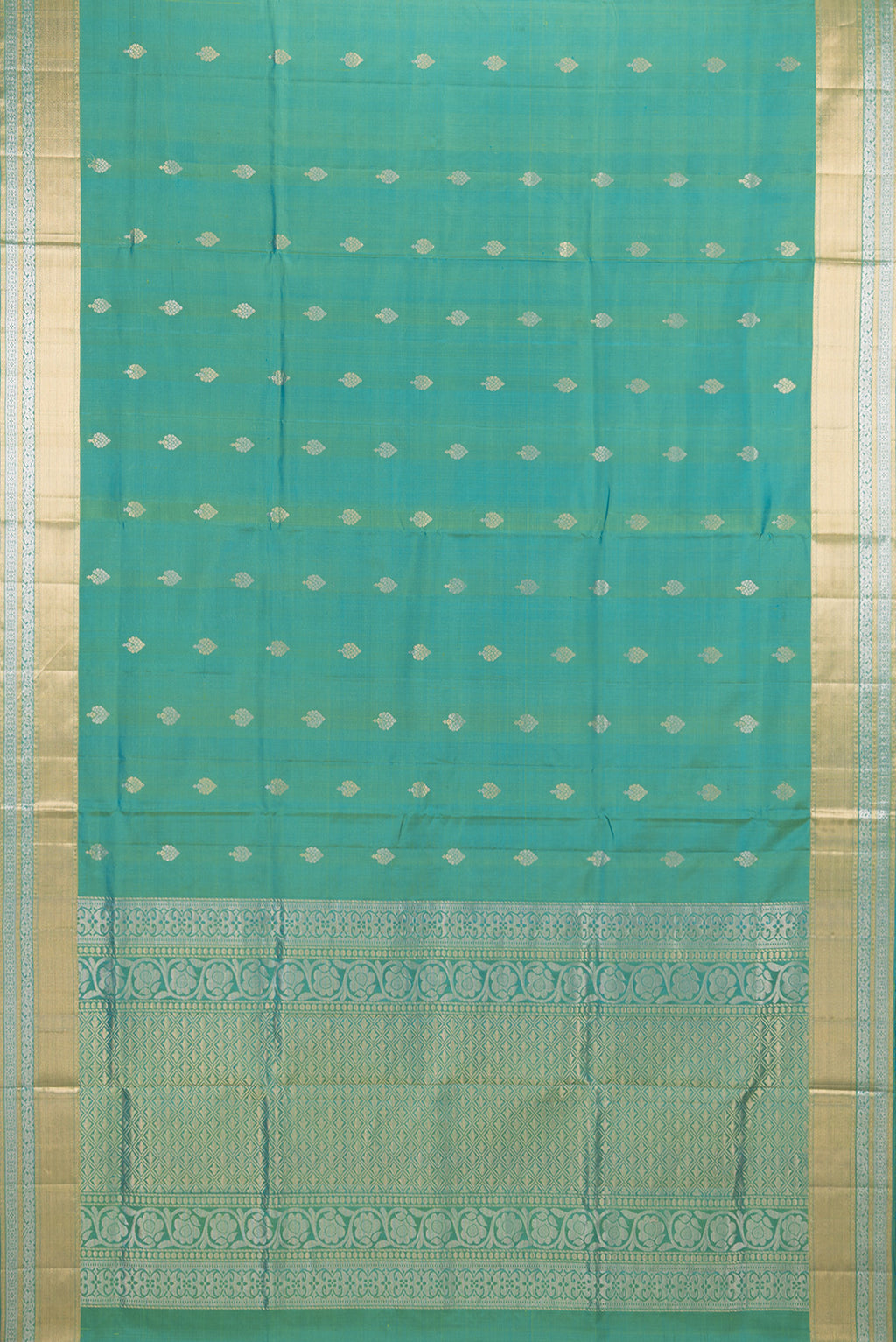 Flat view of Pure Silk Turquoise Dual Tone Soft Saree with Zari Butta on the body and Zari Border. 